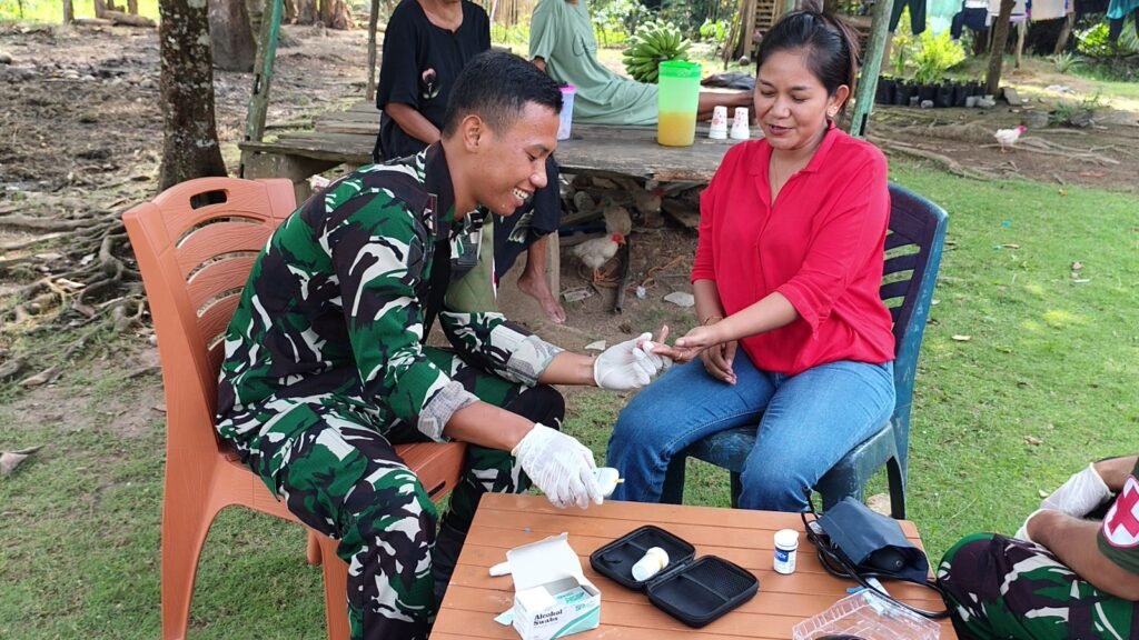 Warga Lembo Antusias Sambut Layanan Pengobatan Gratis Yonif TP 825/GYS